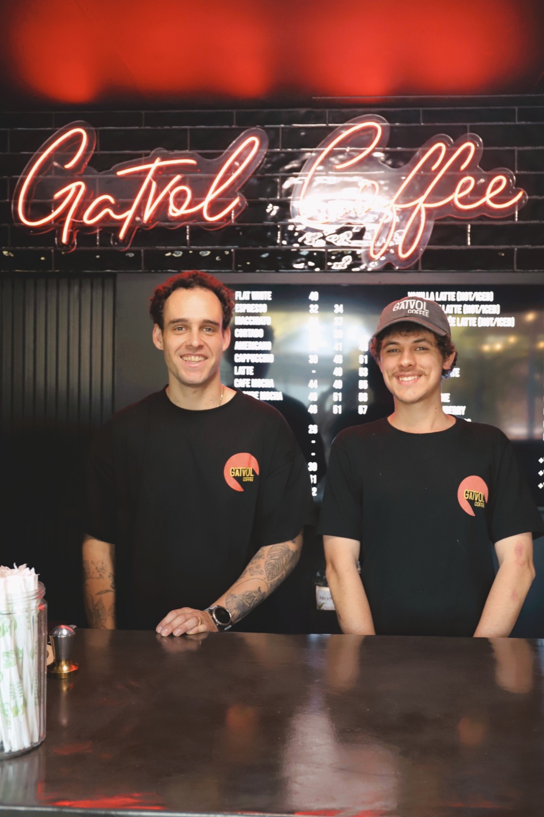 Two Gatvol Coffee Pretoria team members behind the counter
